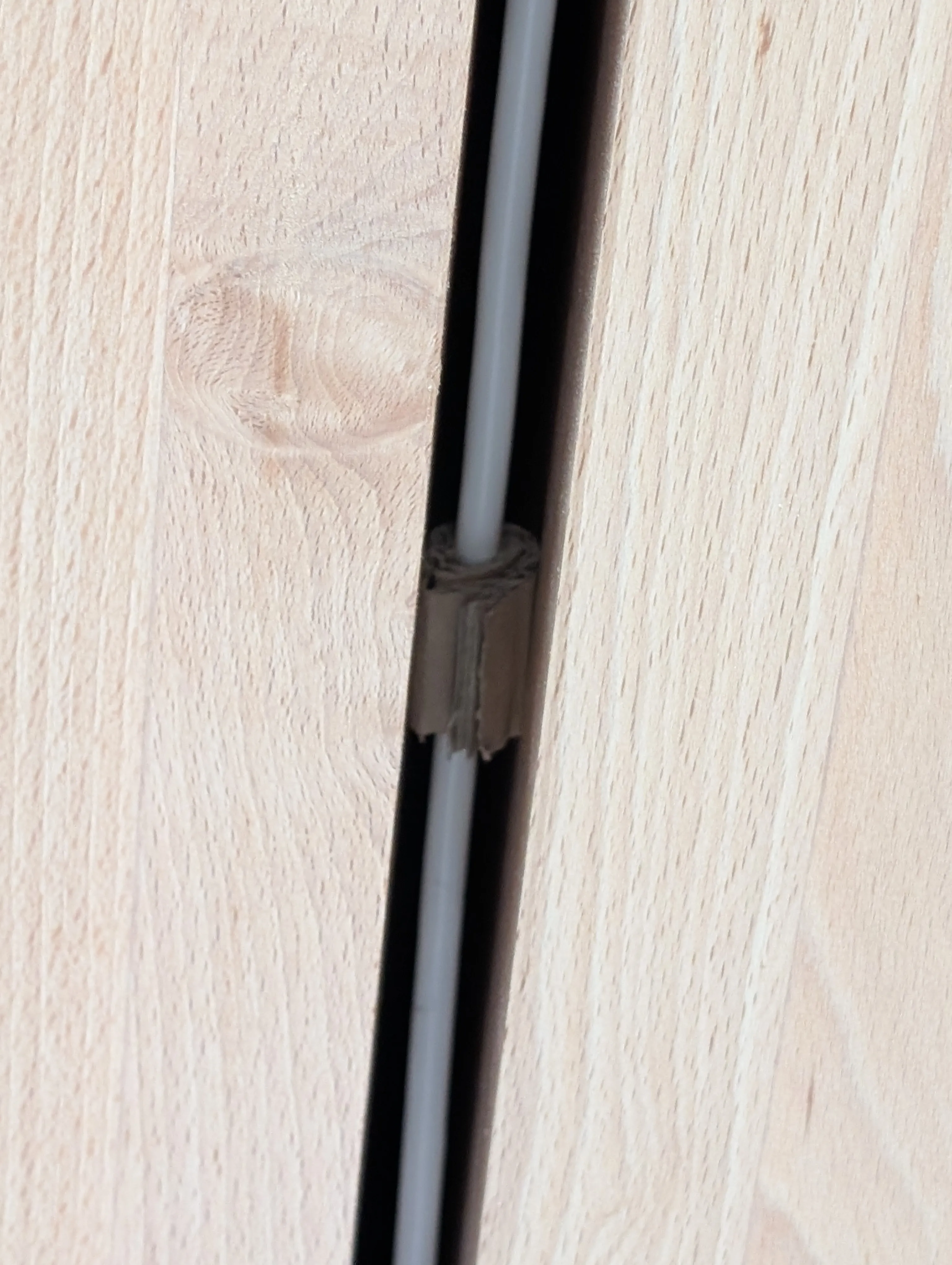 Corrugated Fiberboard Retaining Device